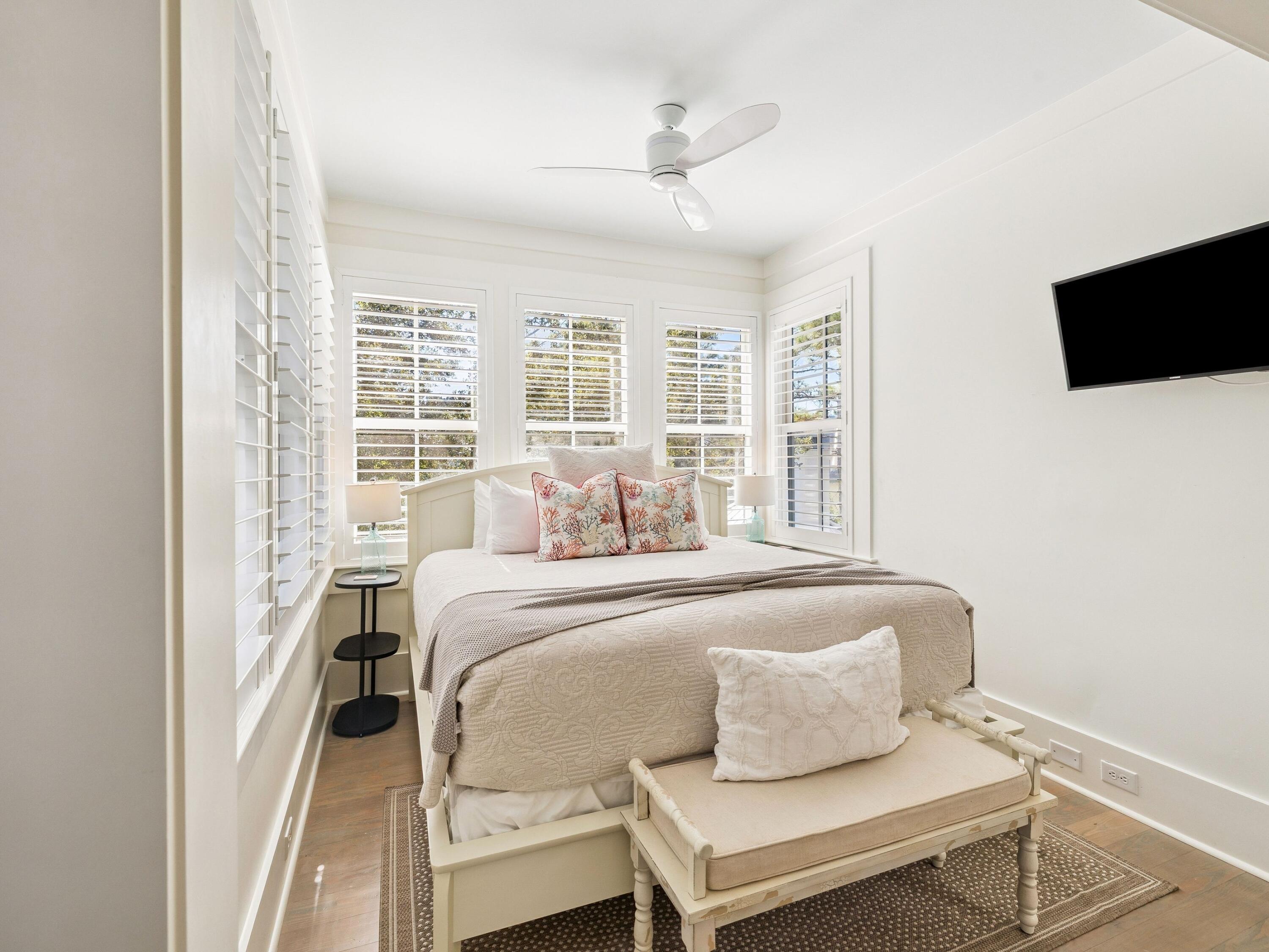 134 Spartina Circle Santa Rosa Beach, FL 32459 - Photo 29 of 41 a bedroom with a bed and flat screen tv