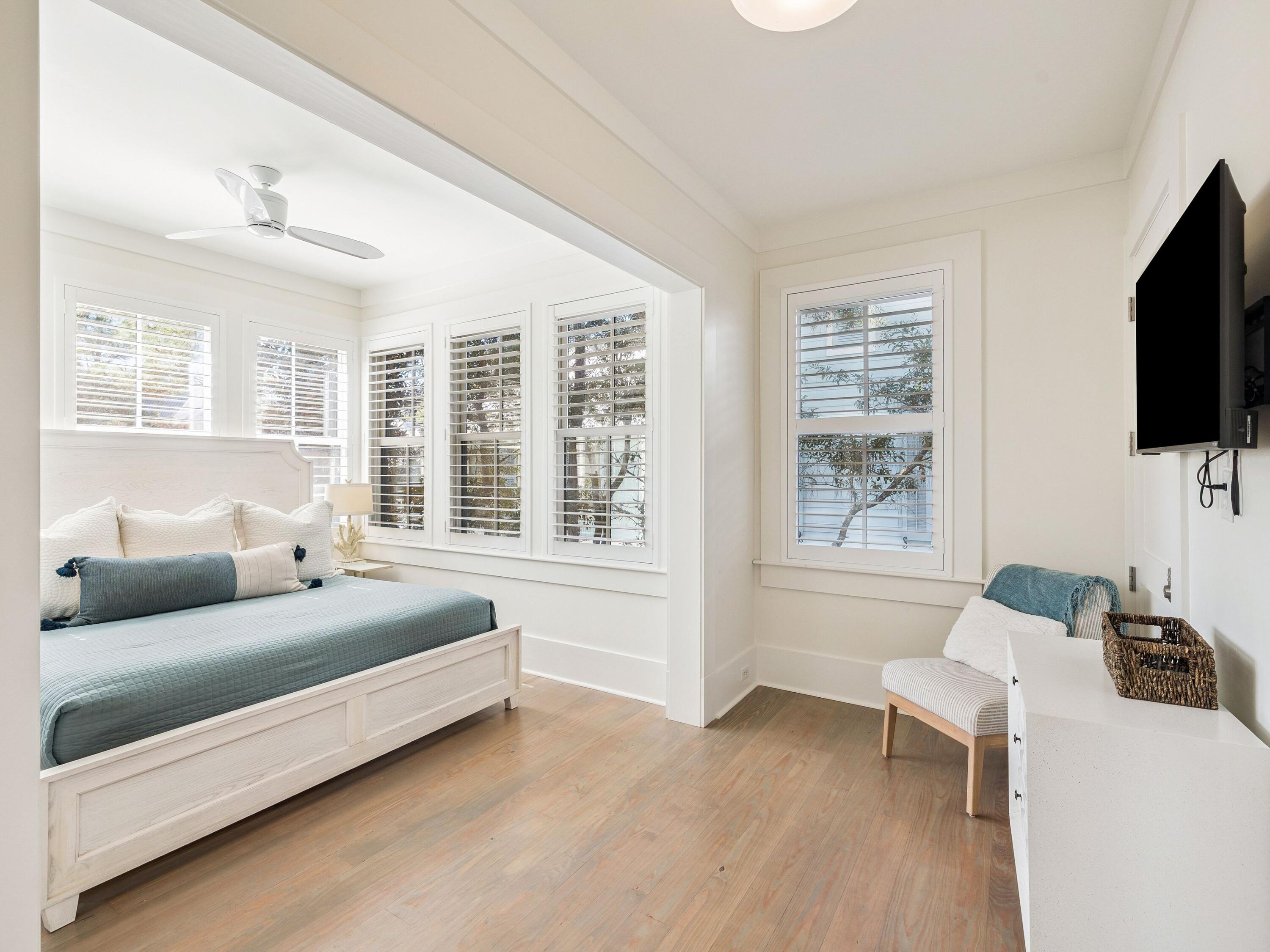 134 Spartina Circle Santa Rosa Beach, FL 32459 - Photo 33 of 41 a living room with furniture and a flat screen tv