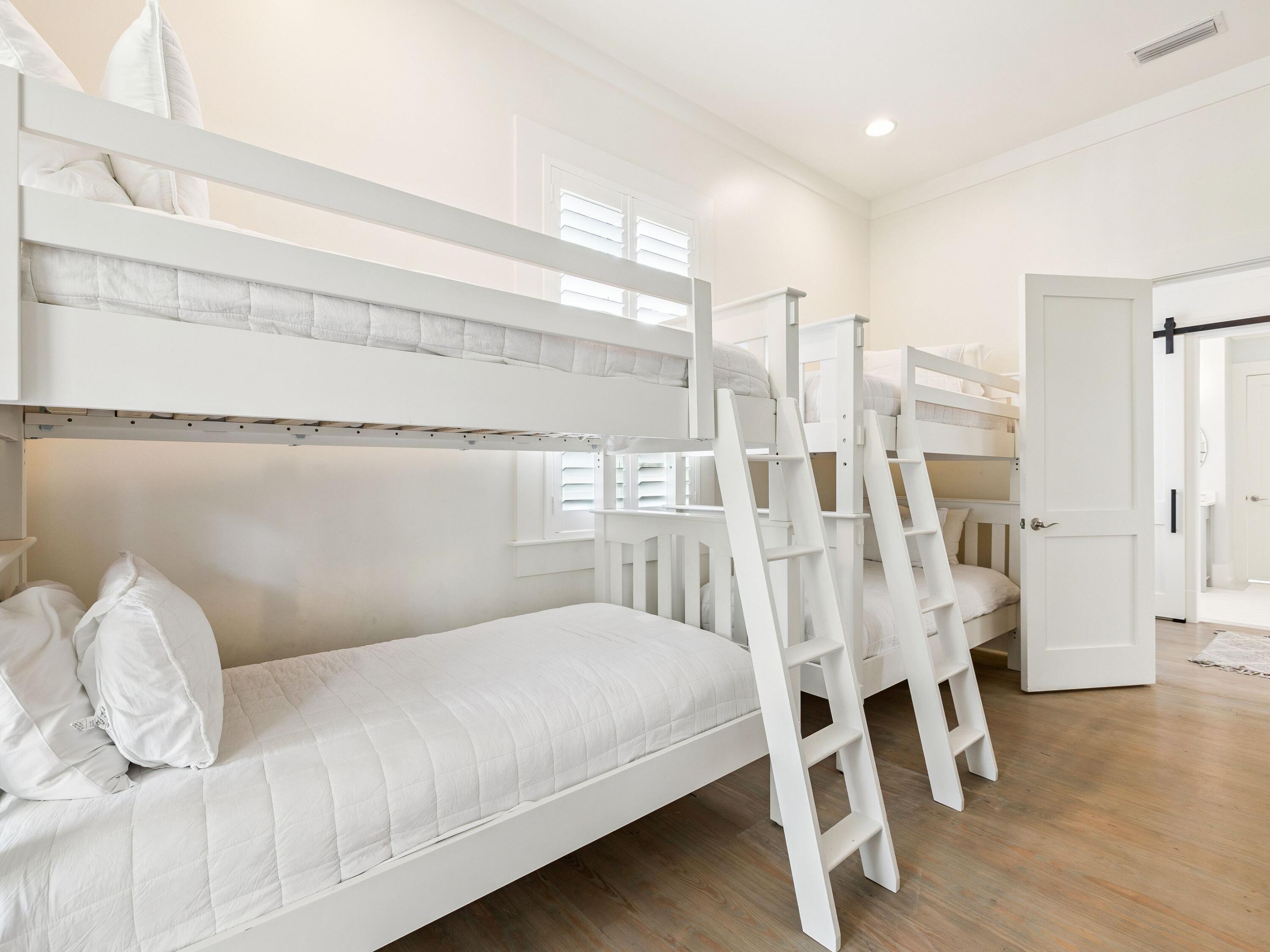 134 Spartina Circle Santa Rosa Beach, FL 32459 - Photo 5 of 41 a bedroom with a bed and a table