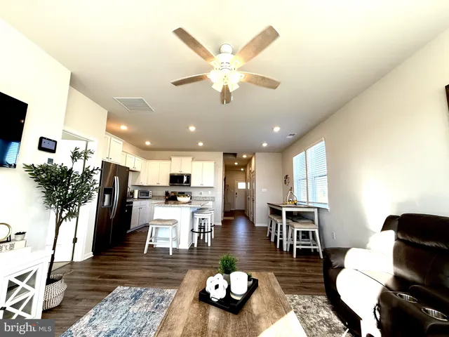 a view of staircase with white walls