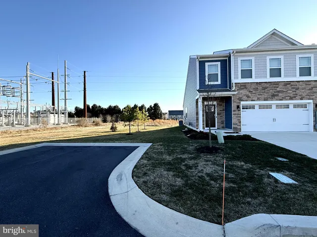 a view of a house with a ocean view