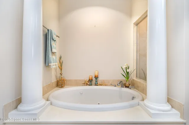 a bathroom with a white tub