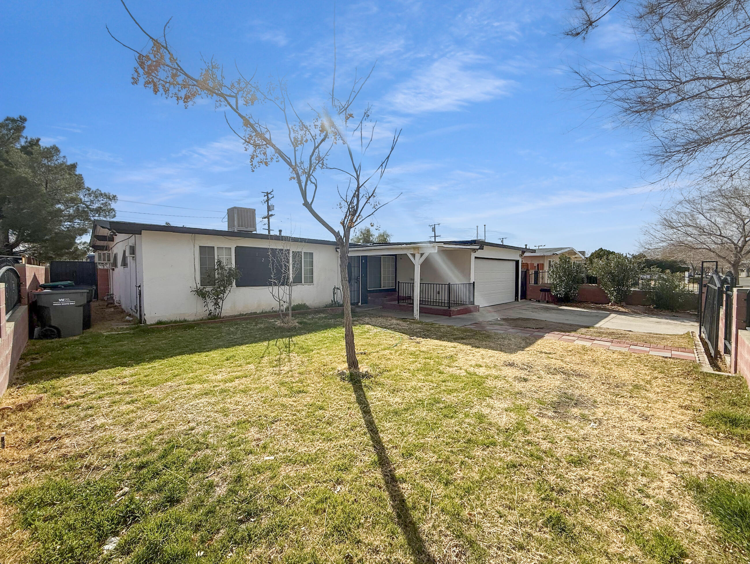 1226 Ave H 15 Lancaster, CA 93534 - Photo 1 of 15 a backyard of a house