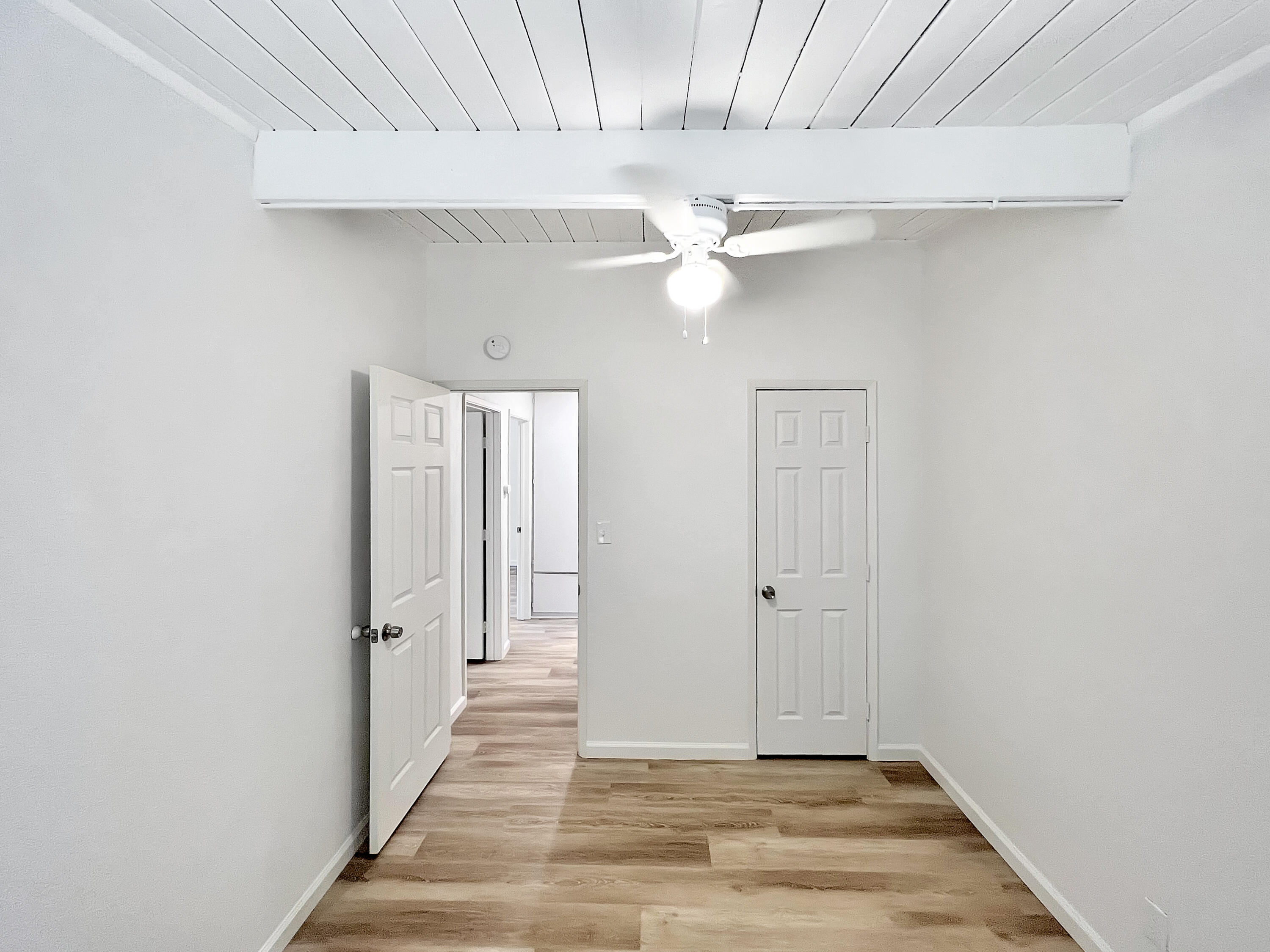 1226 Ave H 15 Lancaster, CA 93534 - Photo 11 of 15 an empty room with wooden floor