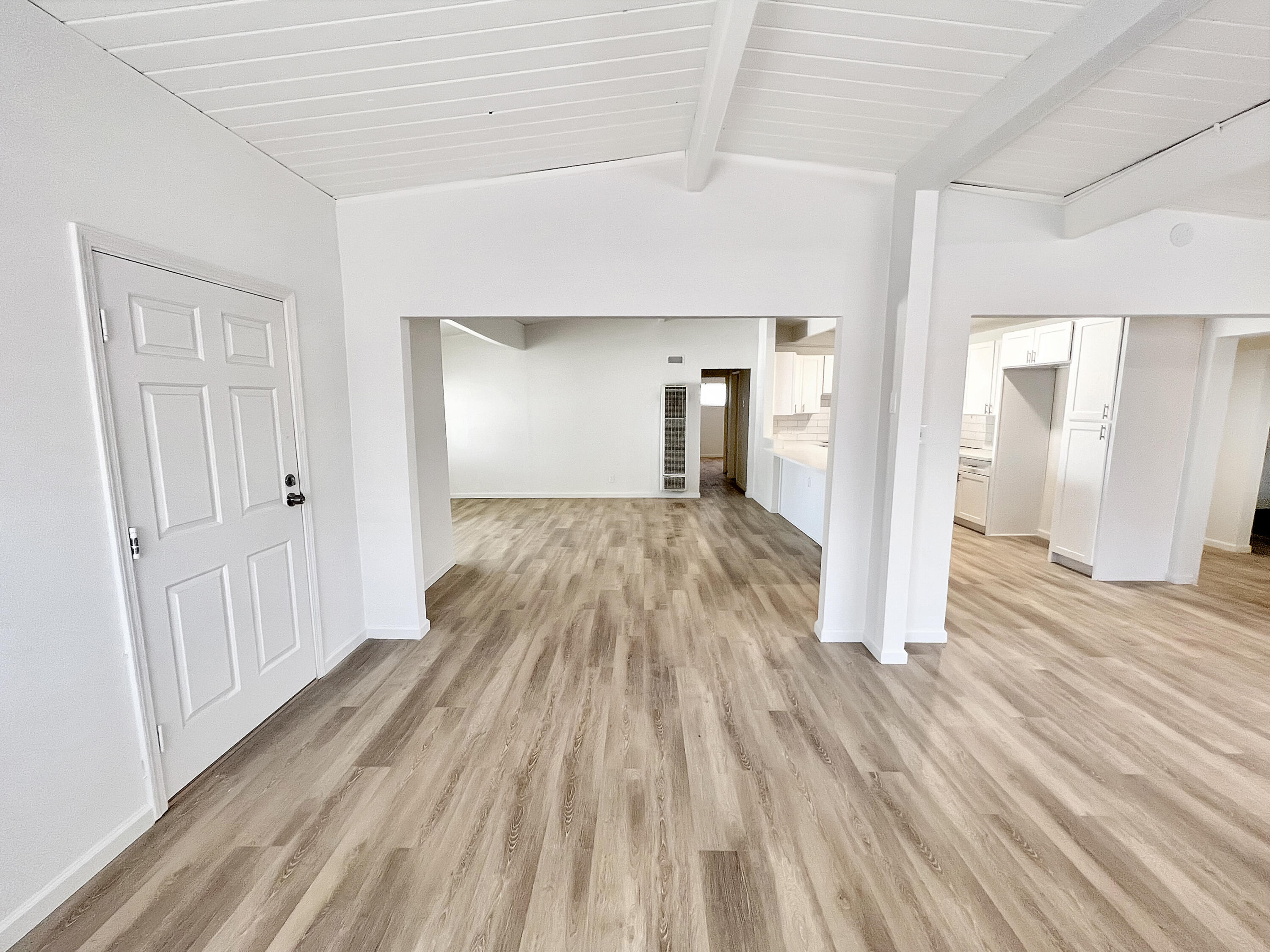 1226 Ave H 15 Lancaster, CA 93534 - Photo 6 of 15 a view of a room with wooden floor staircase and a bathroom
