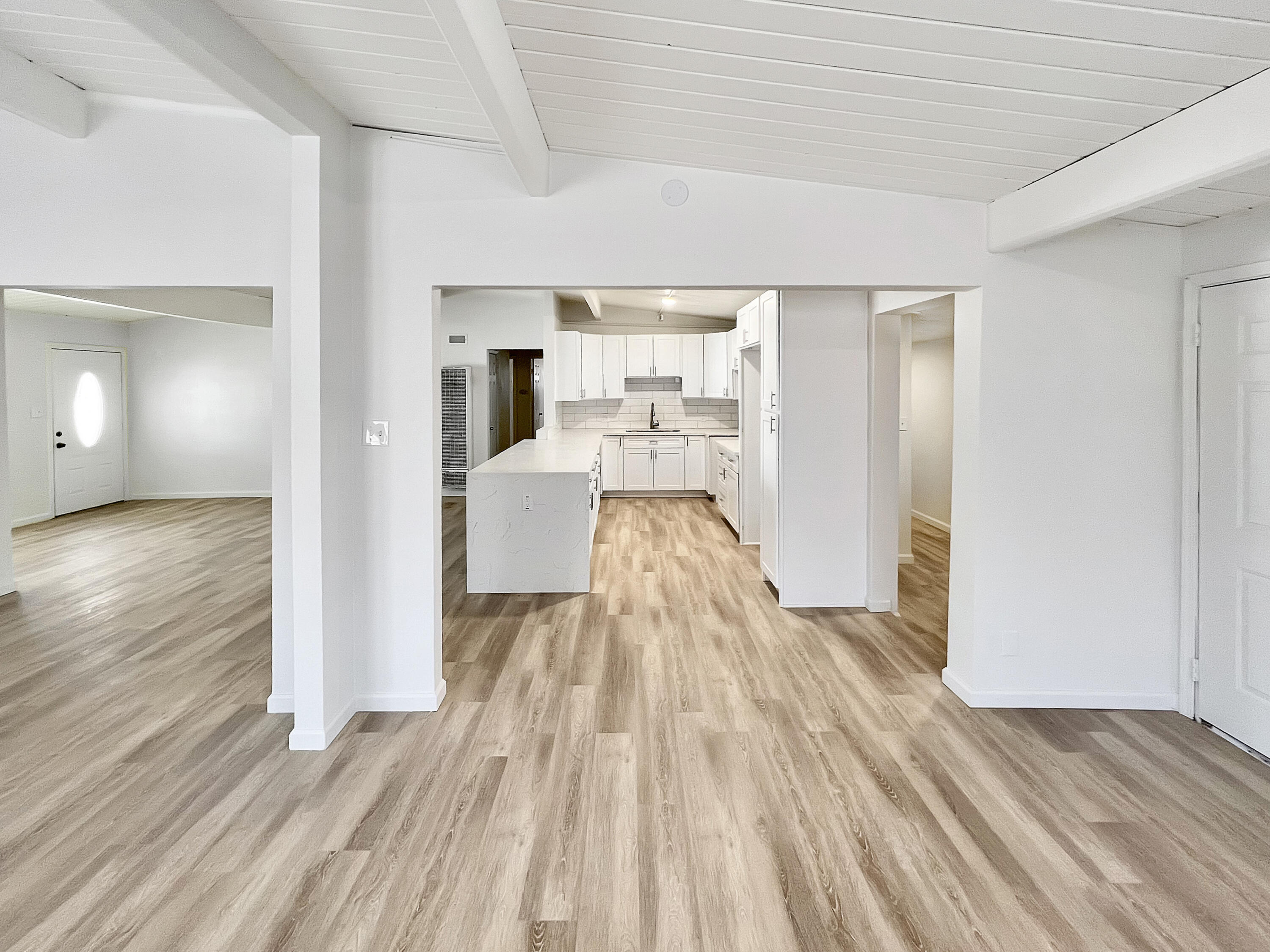 1226 Ave H 15 Lancaster, CA 93534 - Photo 7 of 15 a view of a bedroom with wooden floor