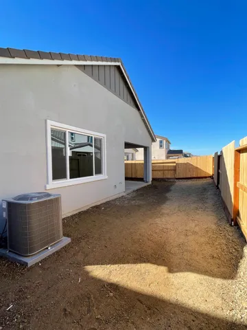 a view of an empty room with windows
