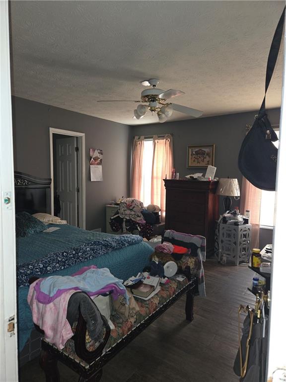 3542 North Hopkins Court Powder Springs, GA 30127 - Photo 13 of 22 a bedroom with bed and a window