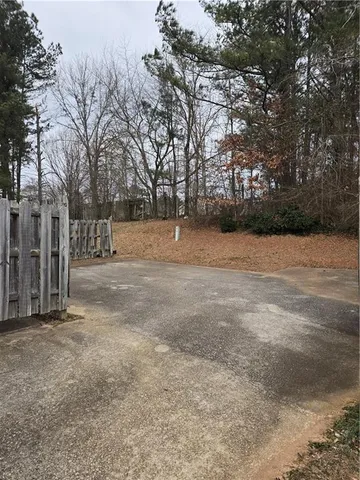 a view of road with a house