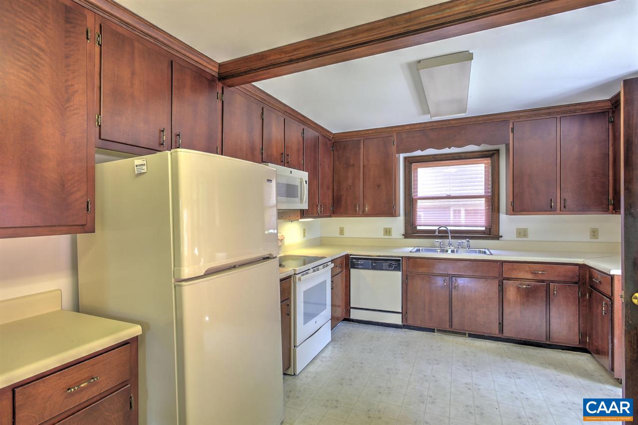 1715 Merriefields Lane Ruckersville, VA 22968 - Photo 16 of 34 a white refrigerator freezer sitting in a kitchen