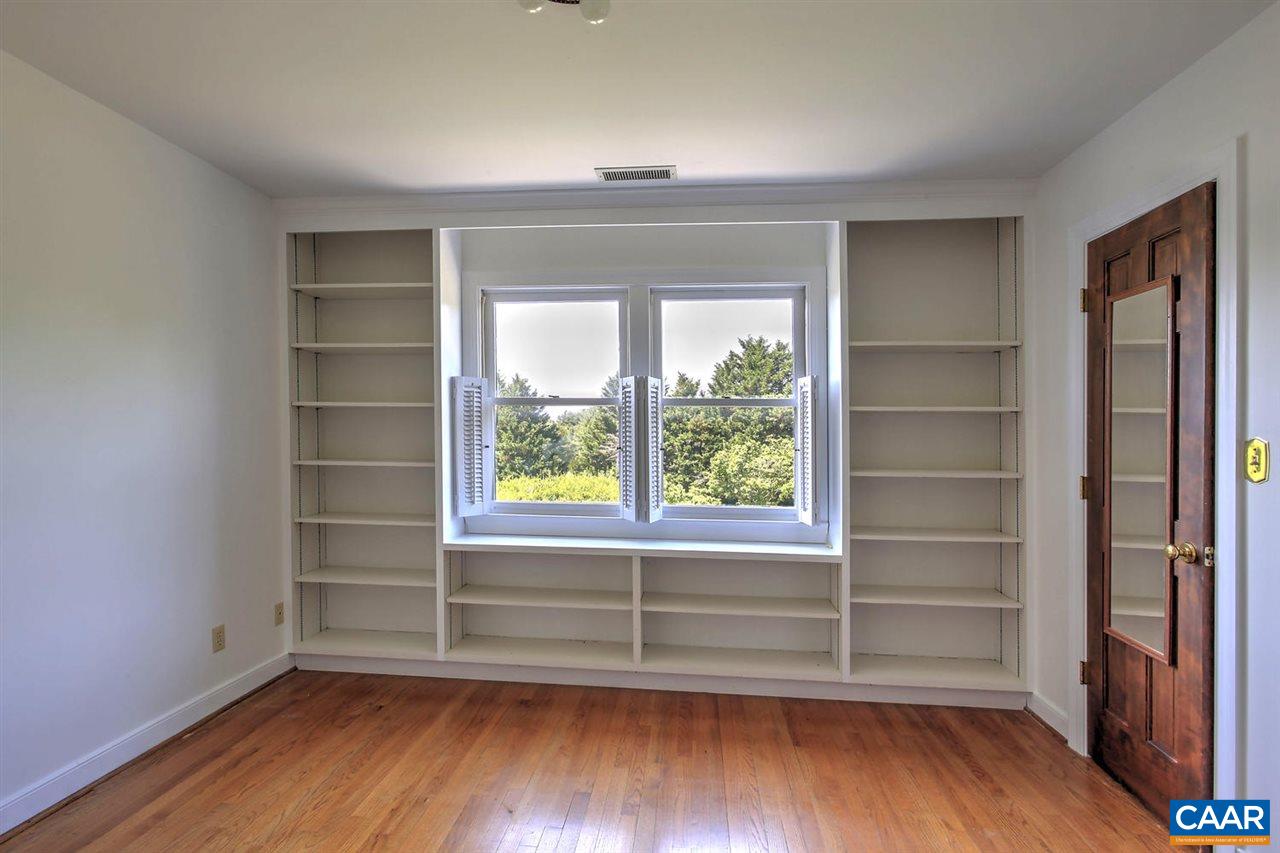 1715 Merriefields Lane Ruckersville, VA 22968 - Photo 23 of 34 a view of wooden floor and windows in a room