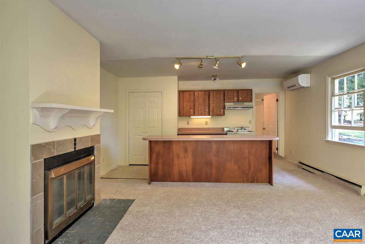 1715 Merriefields Lane Ruckersville, VA 22968 - Photo 28 of 34 a view of kitchen with granite countertop cabinets and refrigerator
