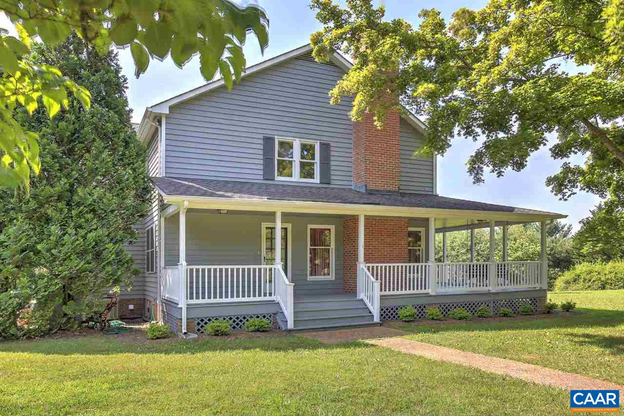 1715 Merriefields Lane Ruckersville, VA 22968 - Photo 4 of 34 a view of a house with a yard and a large tree