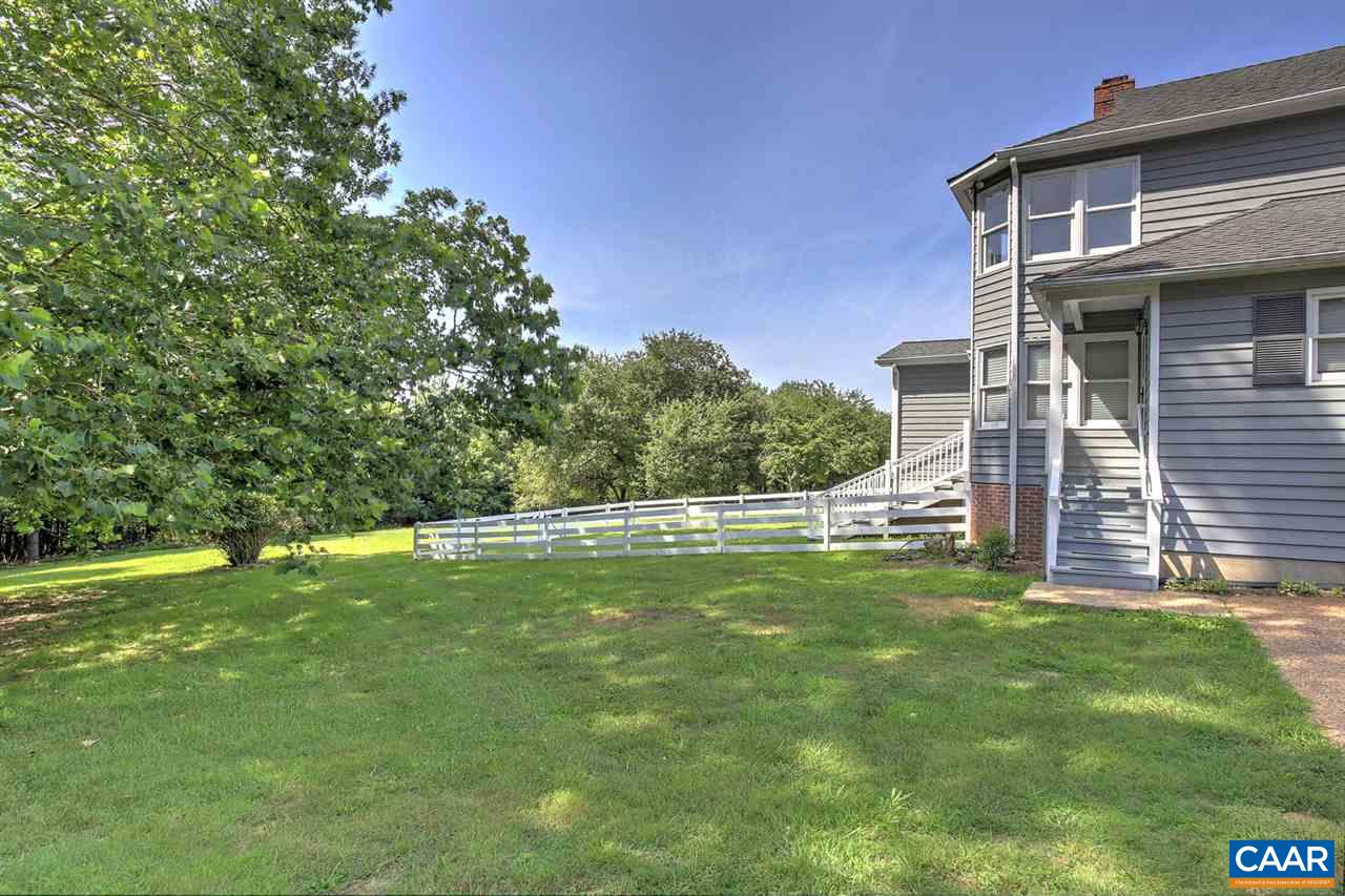 1715 Merriefields Lane Ruckersville, VA 22968 - Photo 7 of 34 a backyard of a house with lots of green space