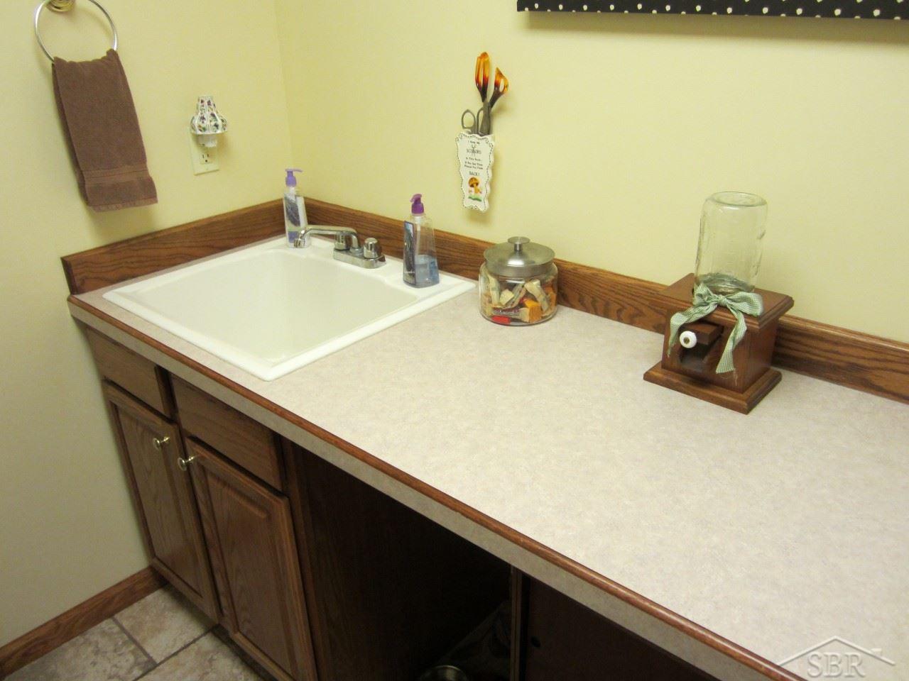 11820 Prior Road St. Charles, MI 48655 - Photo 27 of 43 Utility sink in laundry room