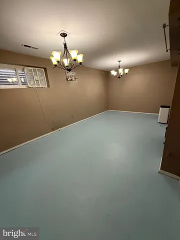 a view of a livingroom with a chandelier