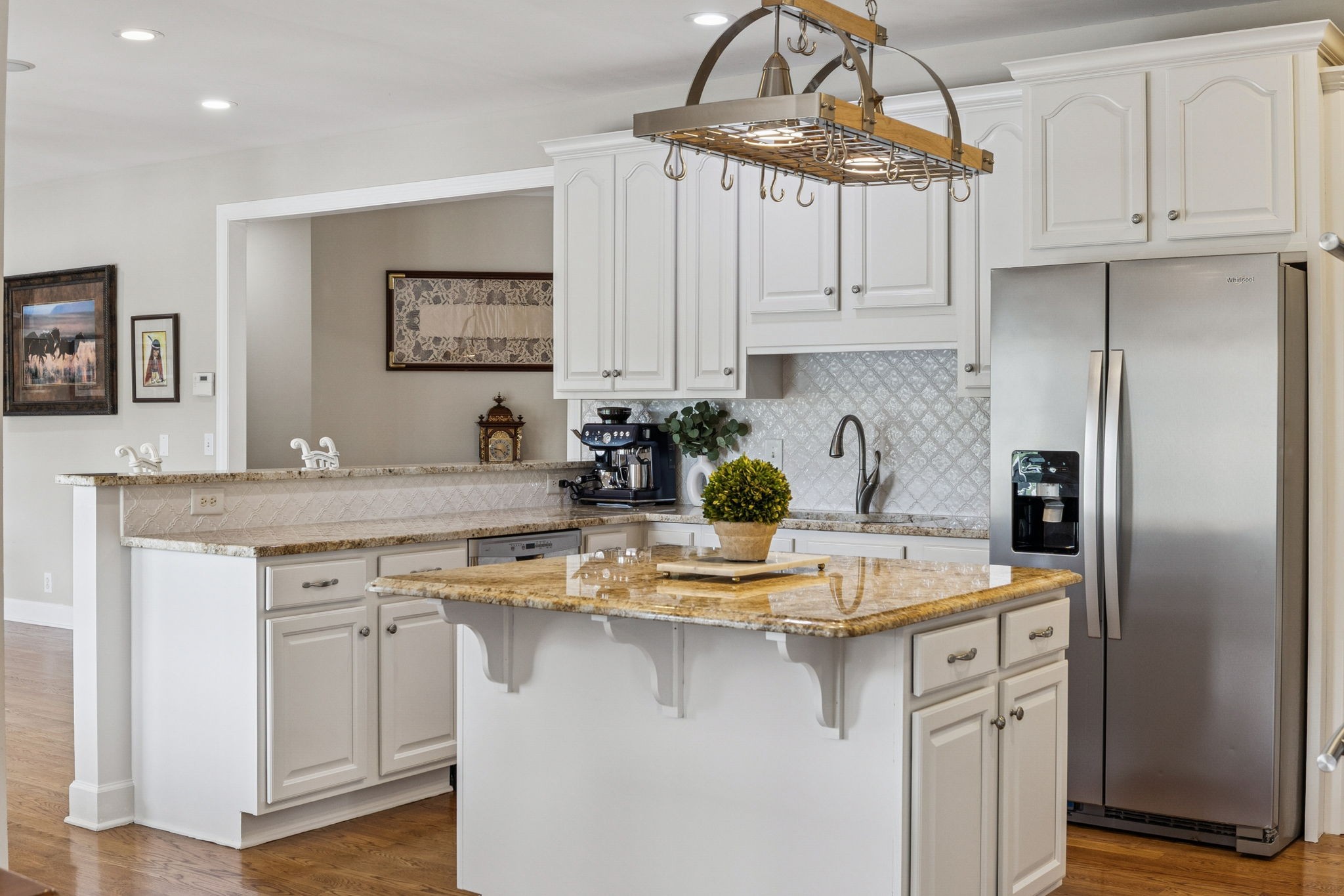 5000 Rucker Christiana Road Christiana, TN 37037 - Photo 27 of 73 a kitchen with kitchen island granite countertop a refrigerator a sink a stove and white cabinets