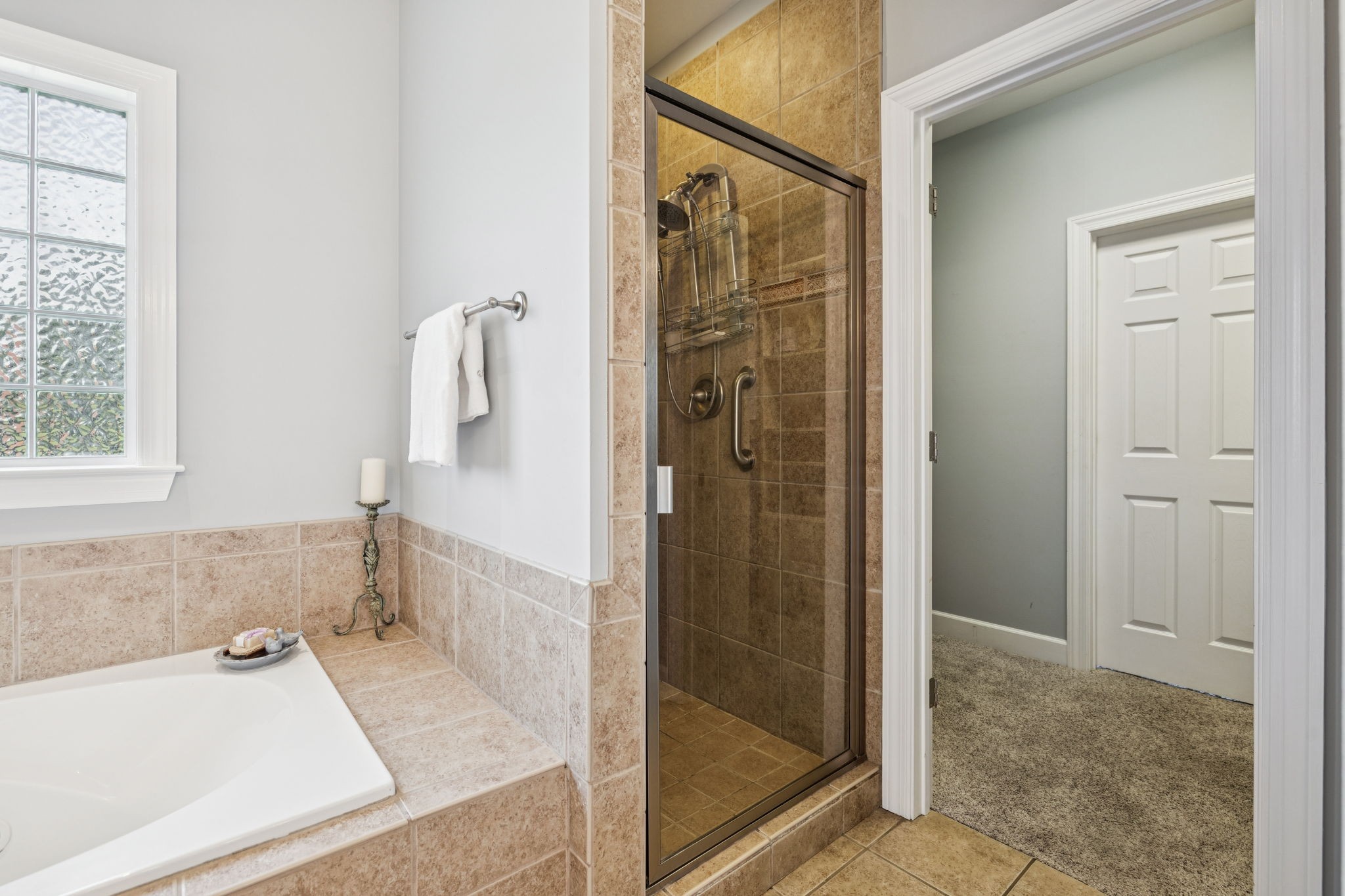 5000 Rucker Christiana Road Christiana, TN 37037 - Photo 40 of 73 a bathroom with a tub and a shower