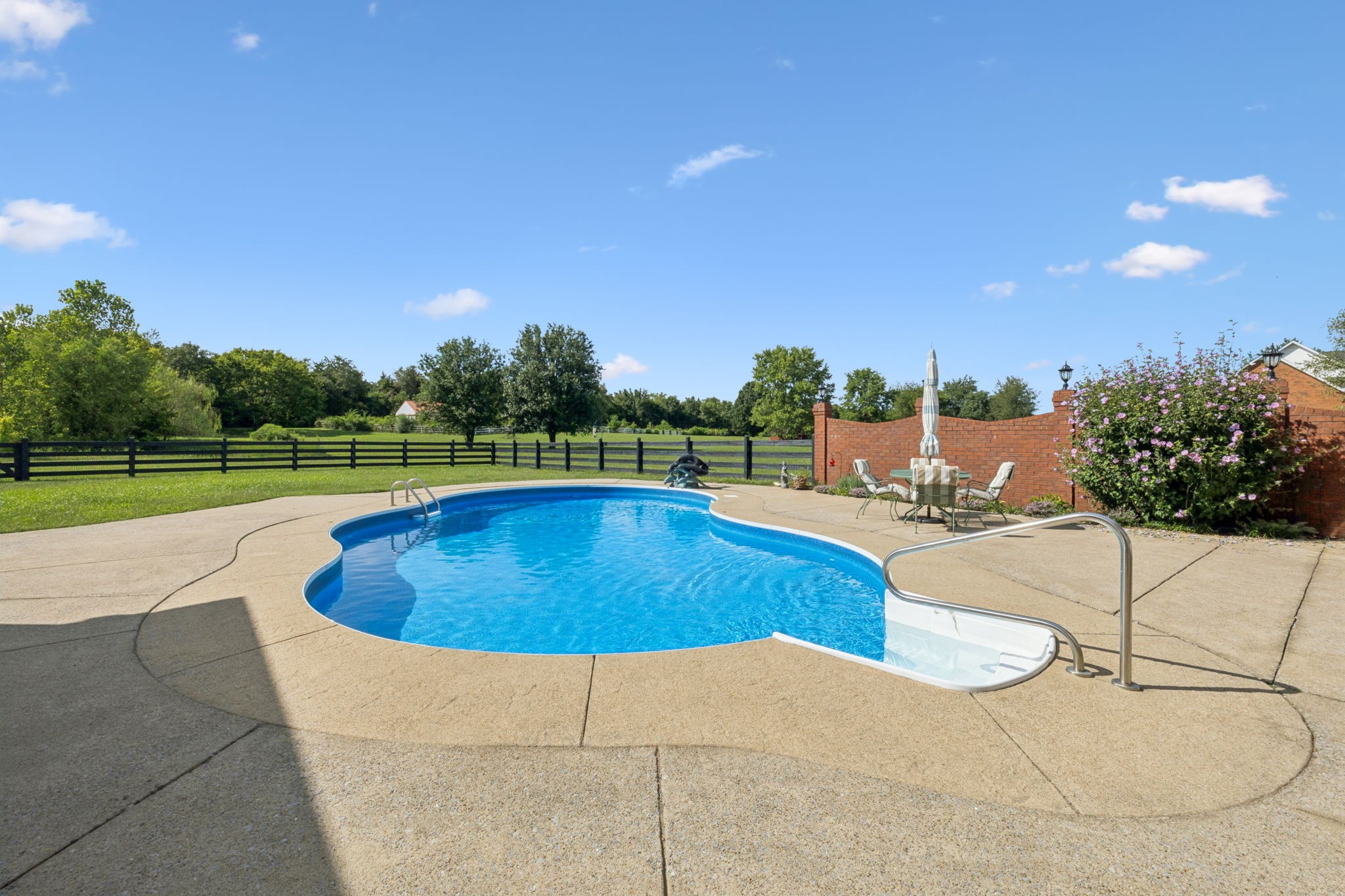 5000 Rucker Christiana Road Christiana, TN 37037 - Photo 55 of 73 a view of a swimming pool with a yard and trees