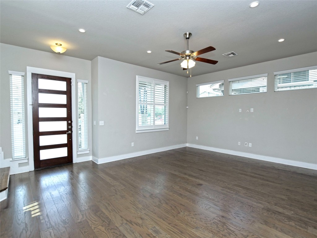7509 Wildcat Pass Austin, TX 78757 - Photo 4 of 38 Foyer featuring dark wood-style flooring, a ceiling fan, and recessed lighting