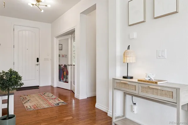 a kitchen with a sink and a refrigerator
