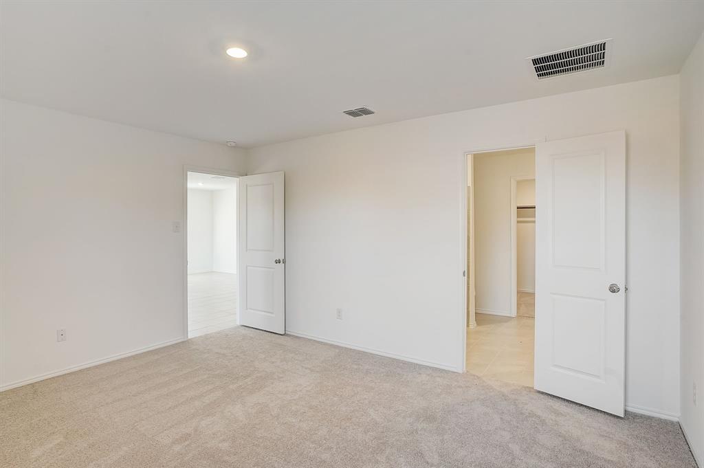 2817 Watchpoint Road Little Elm, TX 75068 - Photo 21 of 40 a view of an empty room