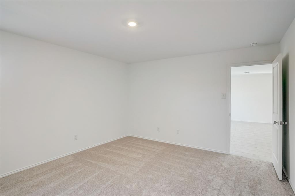 2817 Watchpoint Road Little Elm, TX 75068 - Photo 22 of 40 a view of an empty room