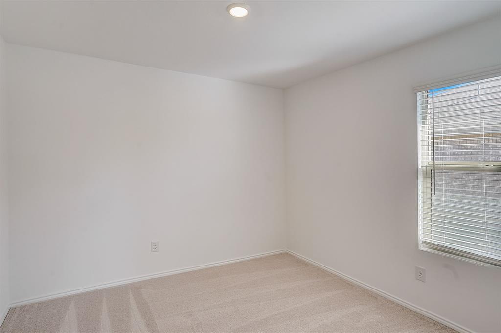 2817 Watchpoint Road Little Elm, TX 75068 - Photo 29 of 40 a view of a small space with a window