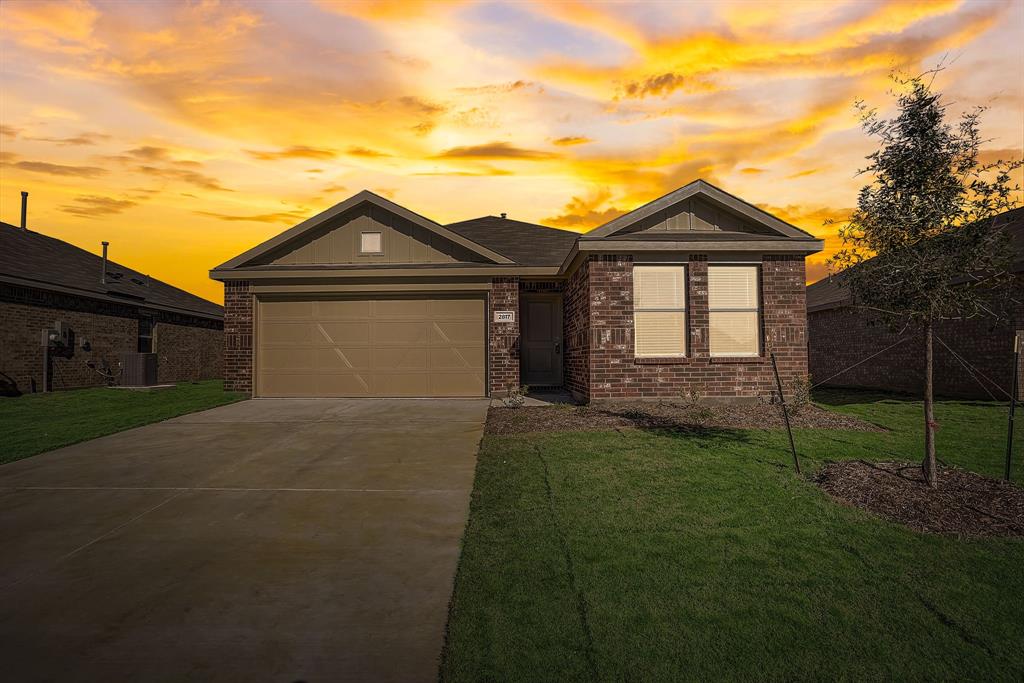 2817 Watchpoint Road Little Elm, TX 75068 - Photo 39 of 40 a front view of a house with a yard