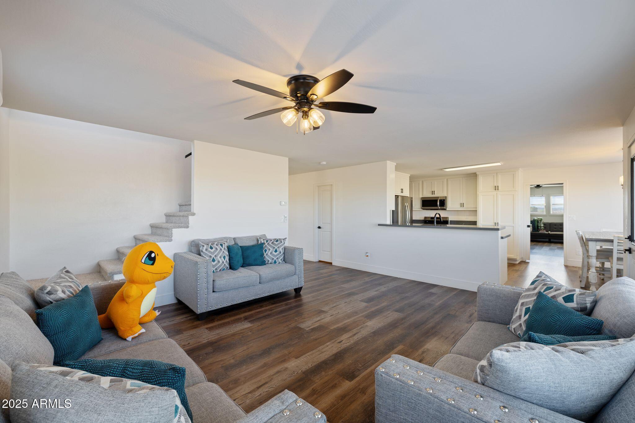 25090 North High Desert Road Paulden, AZ 86334 - Photo 14 of 54 a living room with furniture and wooden floor