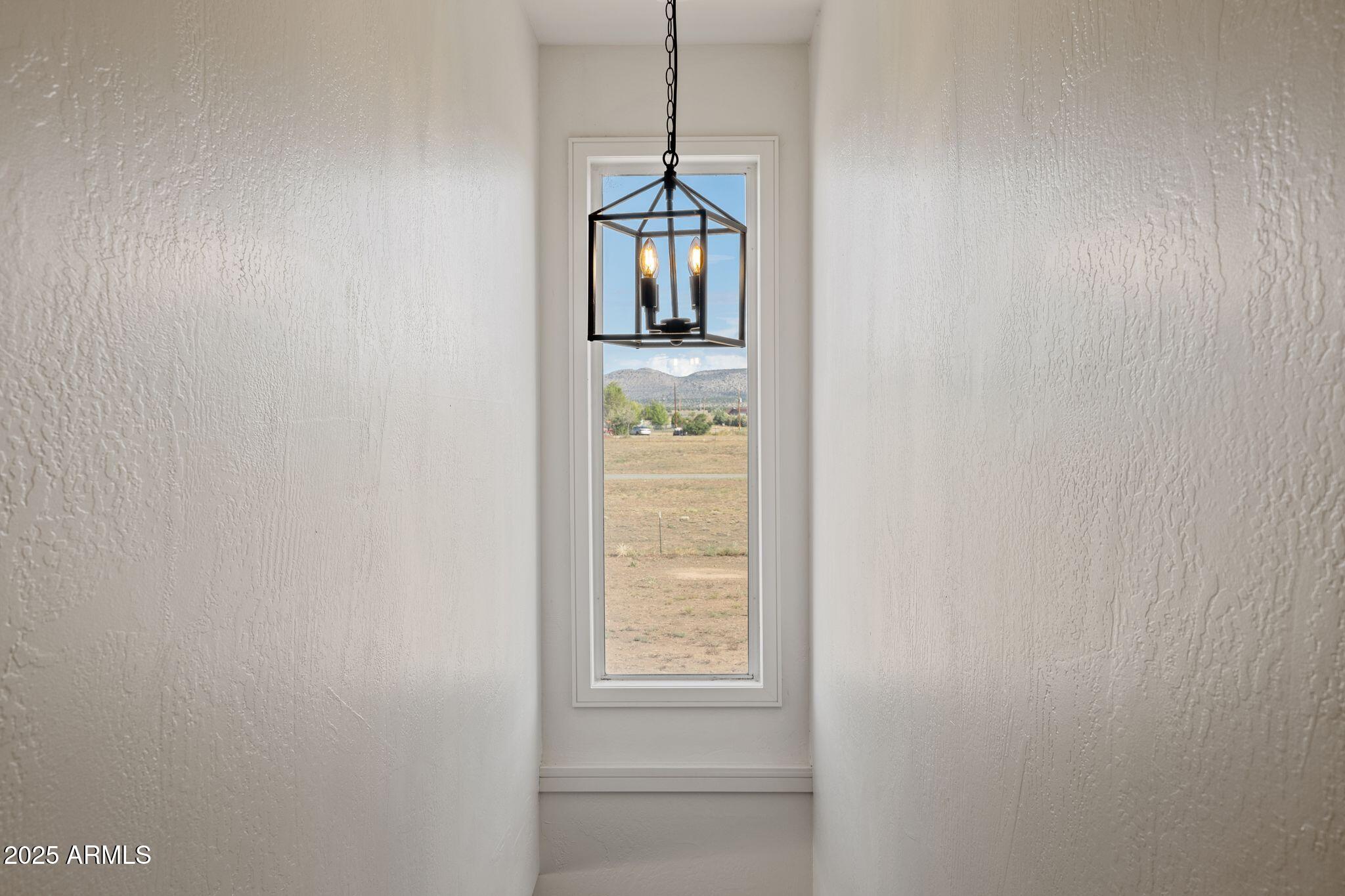25090 North High Desert Road Paulden, AZ 86334 - Photo 29 of 54 a view of an empty room with a window