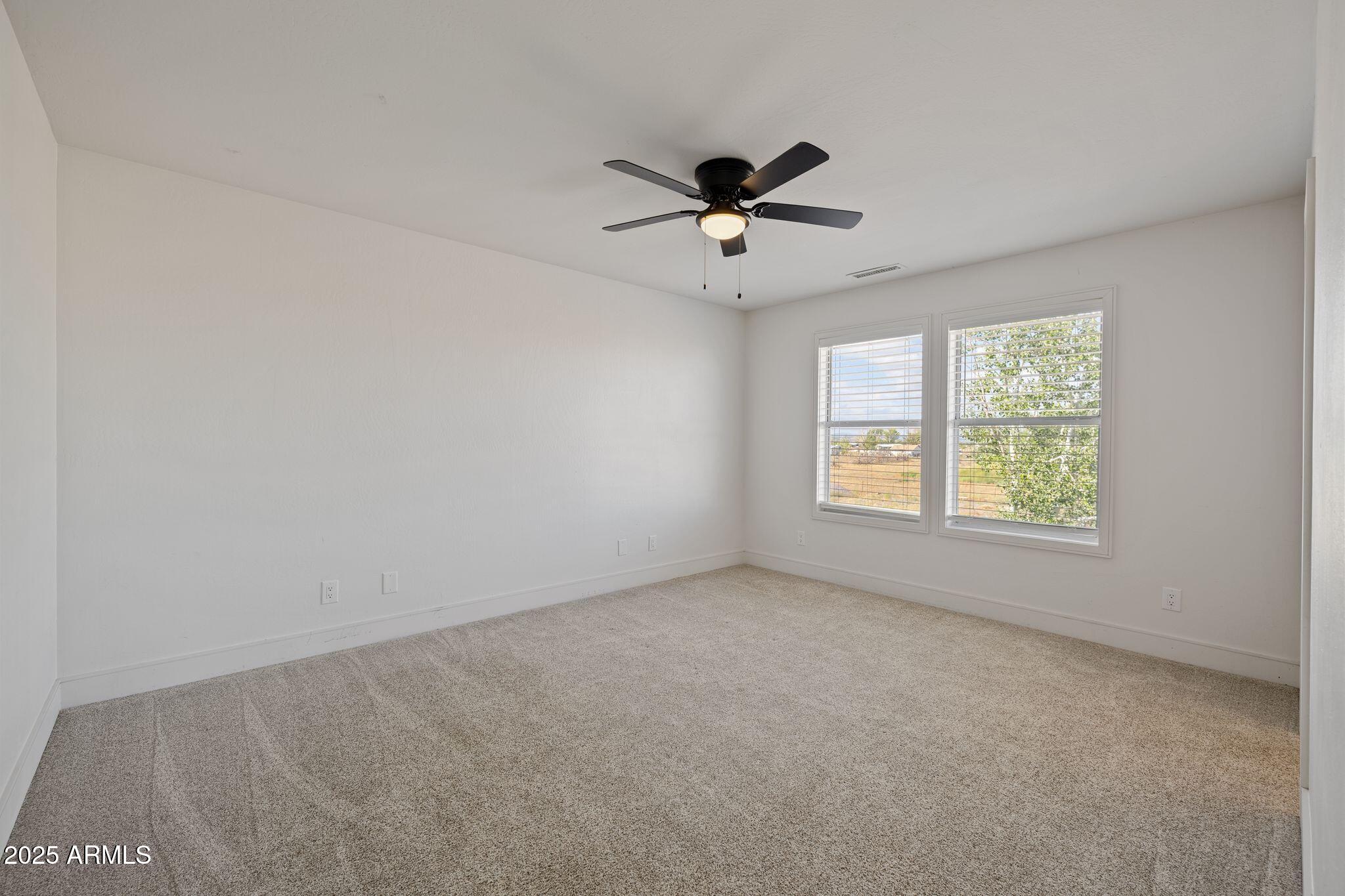 25090 North High Desert Road Paulden, AZ 86334 - Photo 30 of 54 a view of an empty room with a window