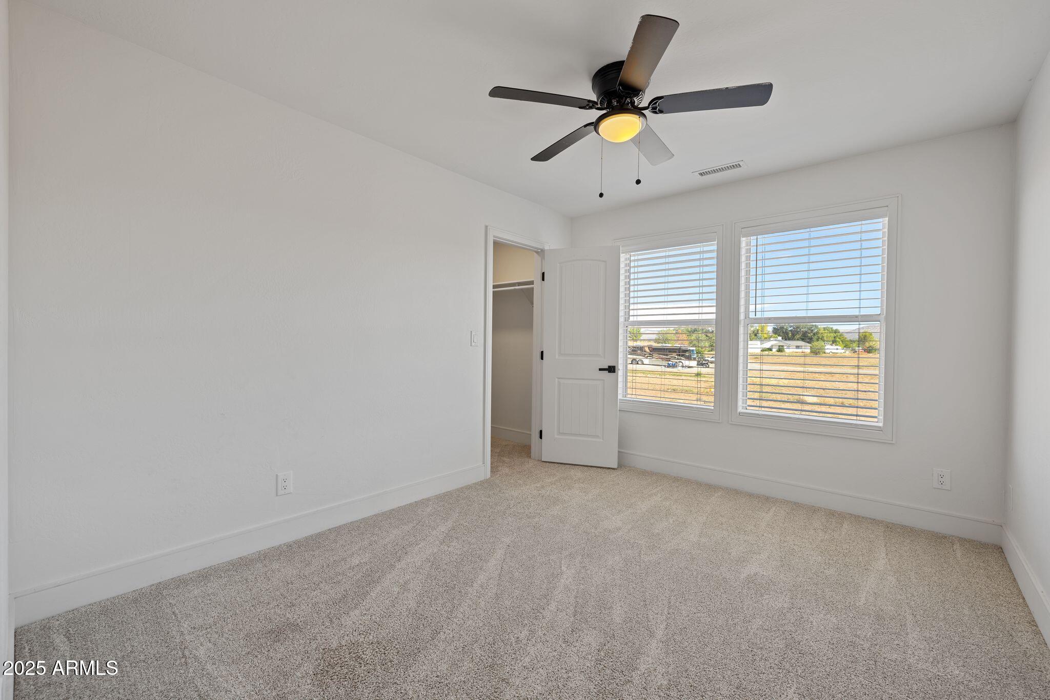25090 North High Desert Road Paulden, AZ 86334 - Photo 36 of 54 a view of an empty room with a window