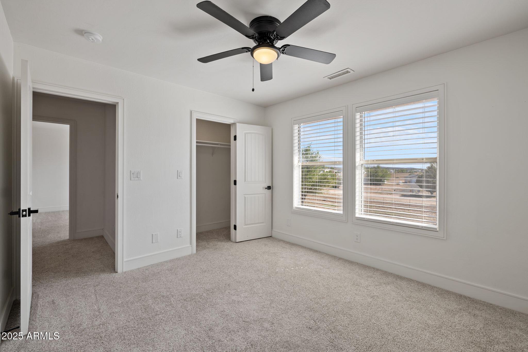 25090 North High Desert Road Paulden, AZ 86334 - Photo 40 of 54 a view of an empty room with a window