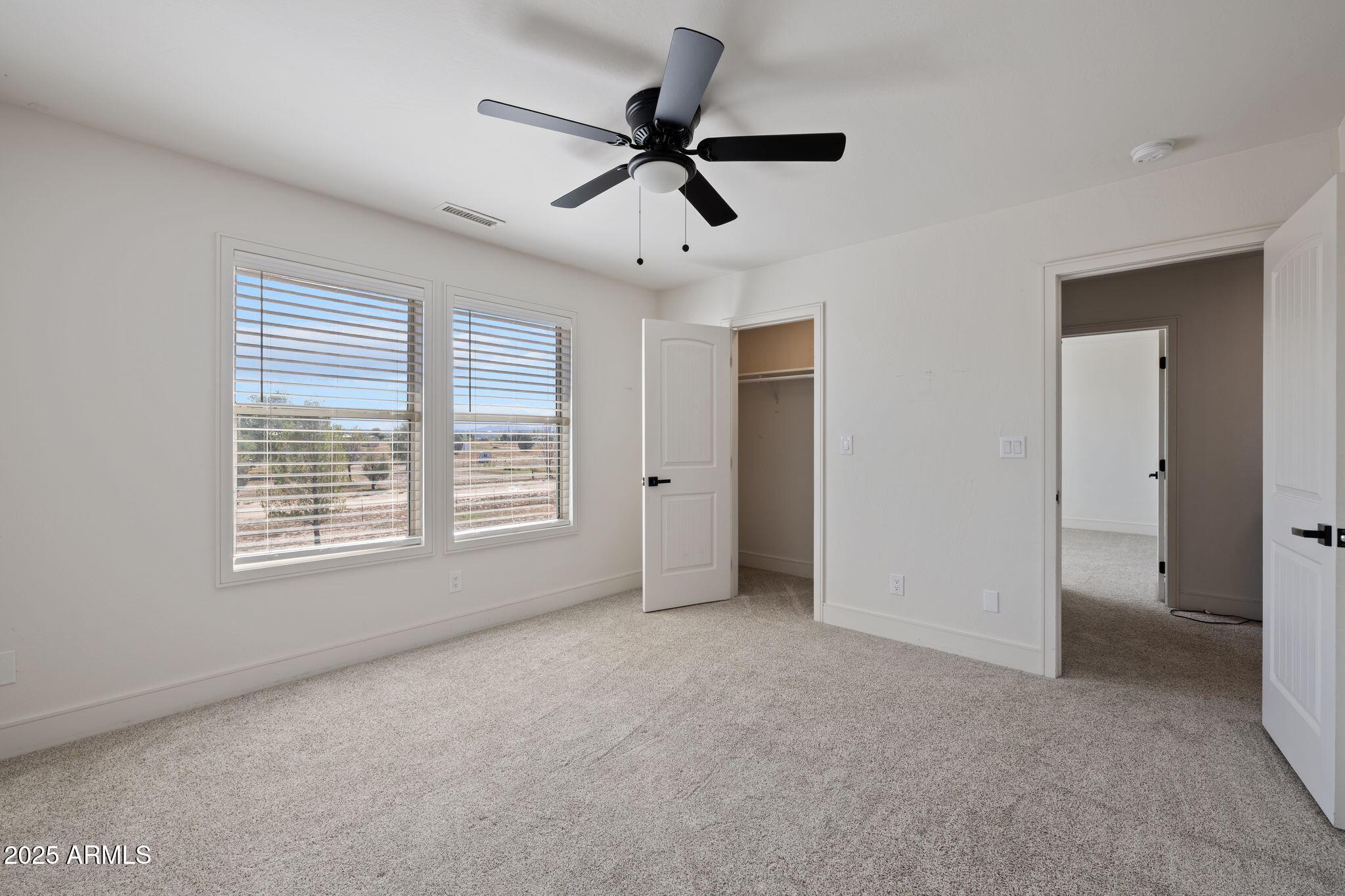 25090 North High Desert Road Paulden, AZ 86334 - Photo 42 of 54 a view of an empty room with a window