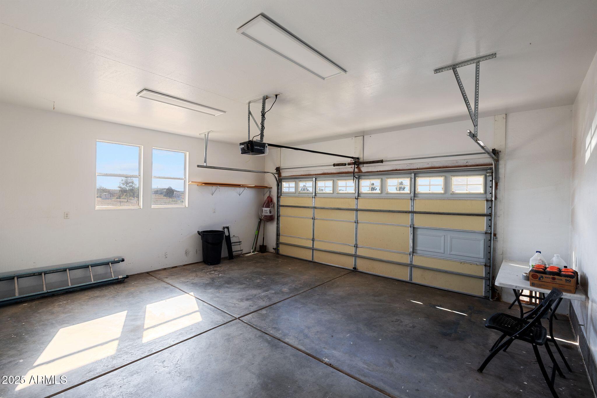 25090 North High Desert Road Paulden, AZ 86334 - Photo 53 of 54 a view of a garage with furniture