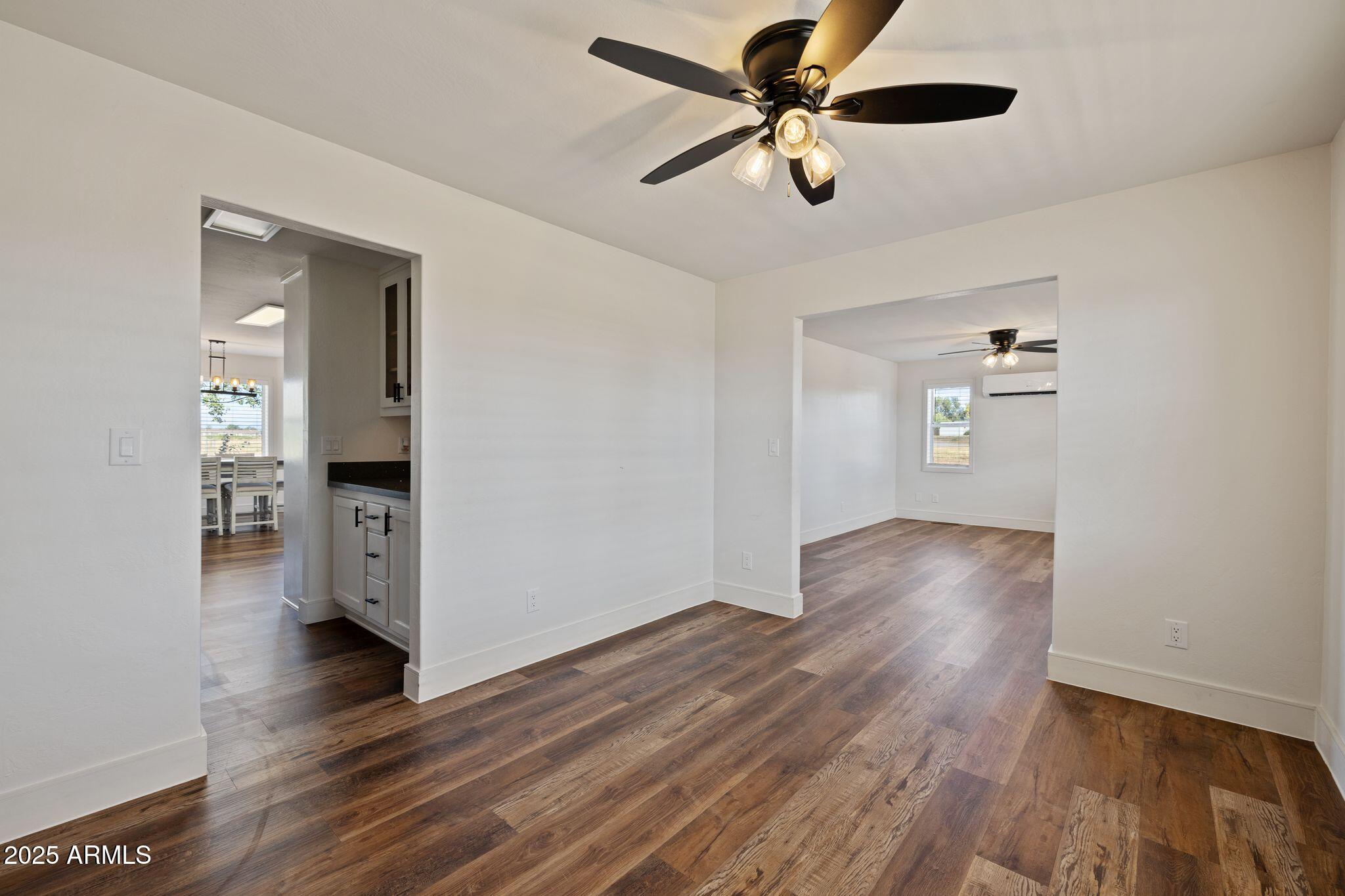 25090 North High Desert Road Paulden, AZ 86334 - Photo 10 of 54 wooden floor in an empty room with a window