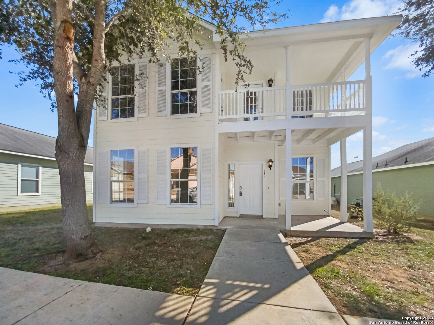 121 Lark Hill Road Floresville, TX 78114 - Photo 1 of 1 a front view of a house with a yard