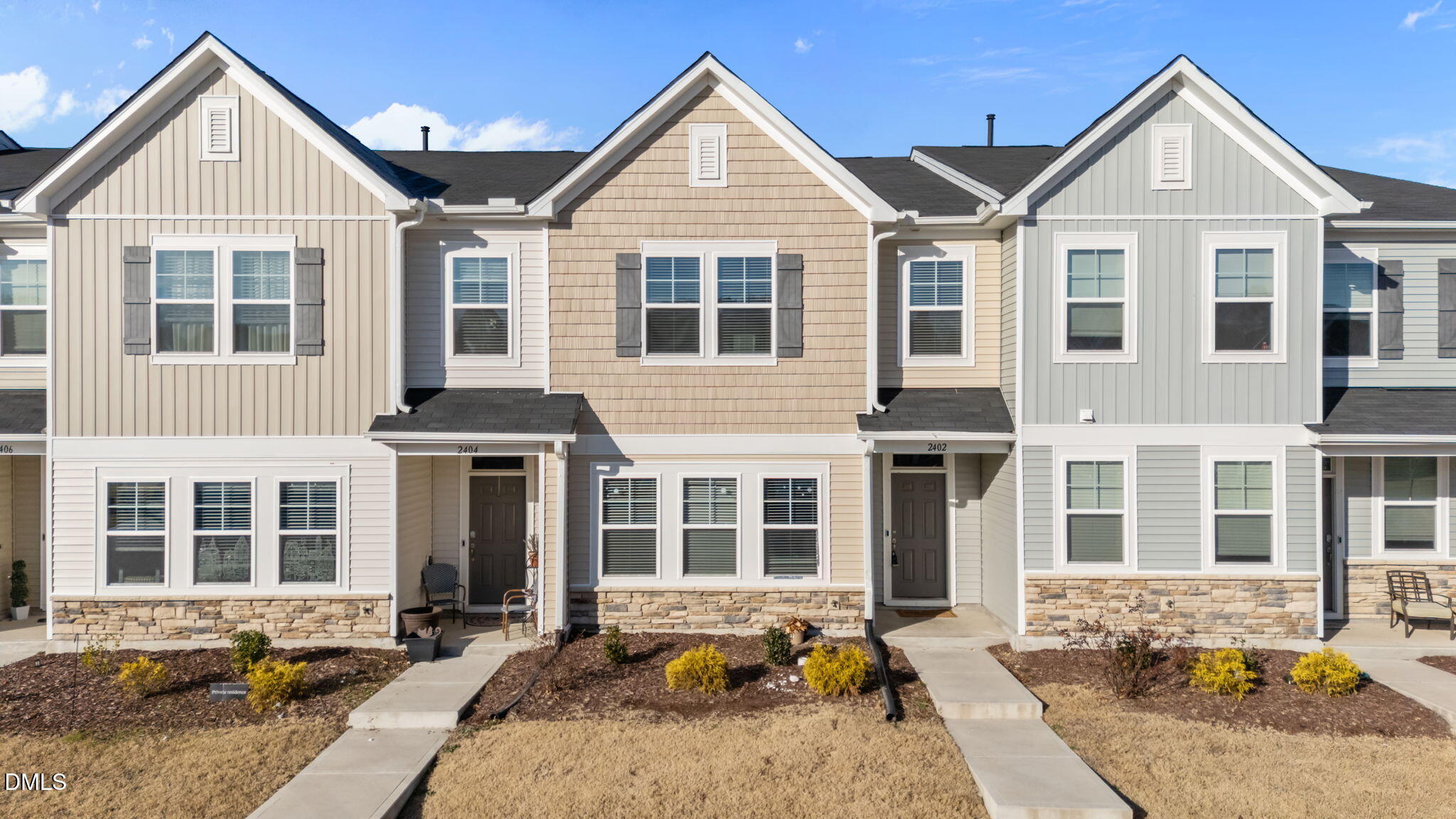 2402 Chert Lane Raleigh, NC 27610 - Photo 1 of 65 a front view of a house with many windows