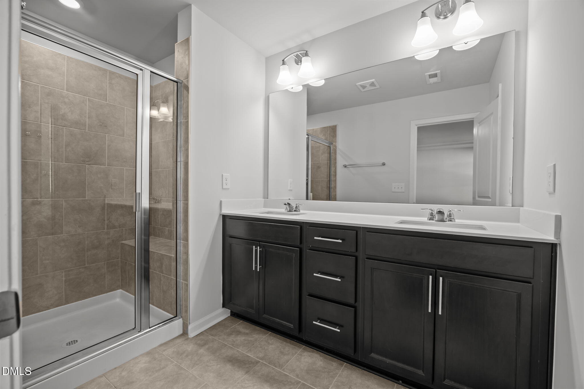 2402 Chert Lane Raleigh, NC 27610 - Photo 21 of 65 a bathroom with a granite countertop sink mirror and double