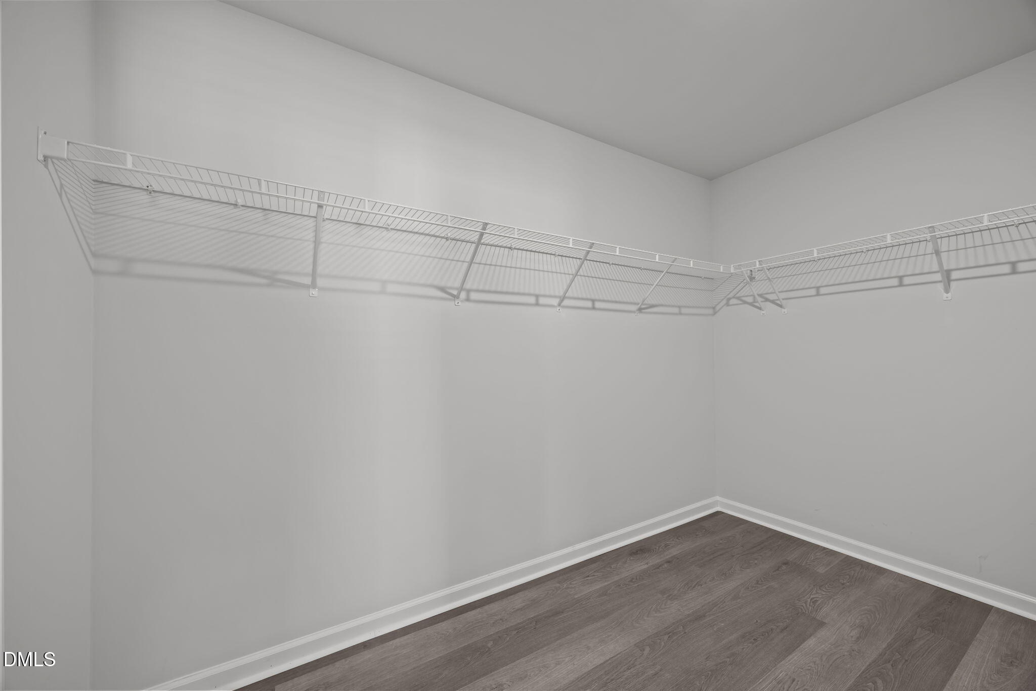 2402 Chert Lane Raleigh, NC 27610 - Photo 32 of 65 a view of a room with racks on the wall