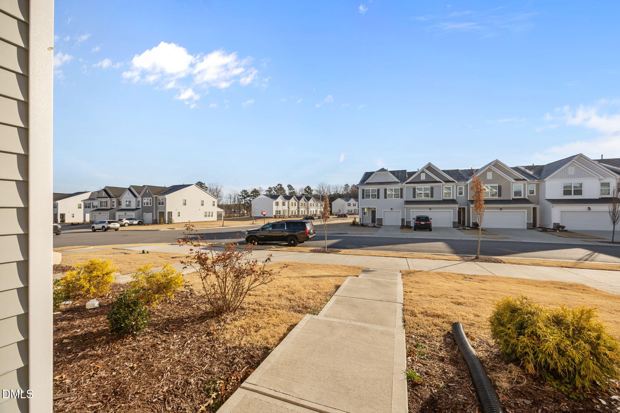 2402 Chert Lane Raleigh, NC 27610 - Photo 4 of 65 a view of swimming pool with a lawn chairs