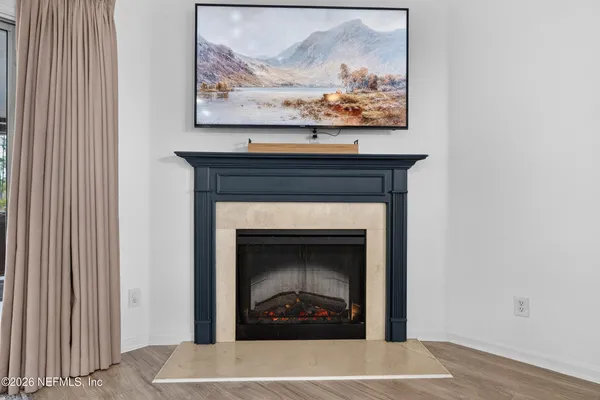 a living room with a fireplace