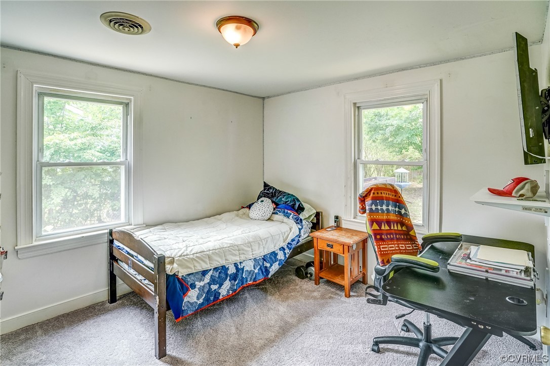 3312 Hawkins Road Henrico, VA 23228 - Photo 11 of 32 a bedroom with bed and a window