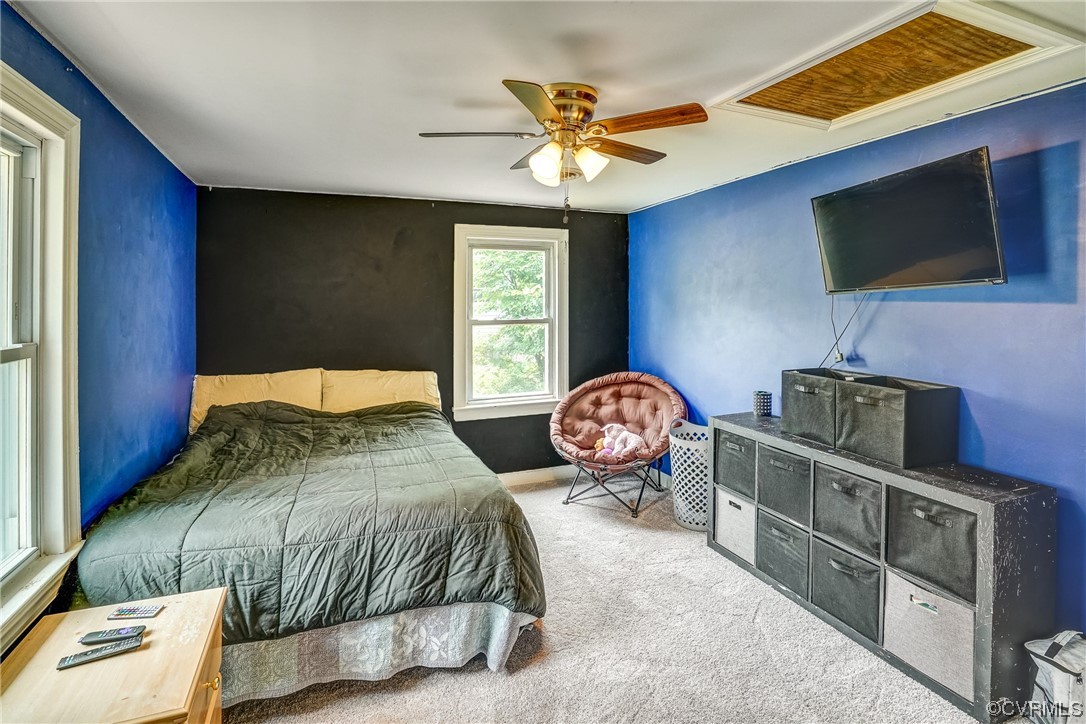 3312 Hawkins Road Henrico, VA 23228 - Photo 13 of 32 a bedroom with a bed and a flat screen tv