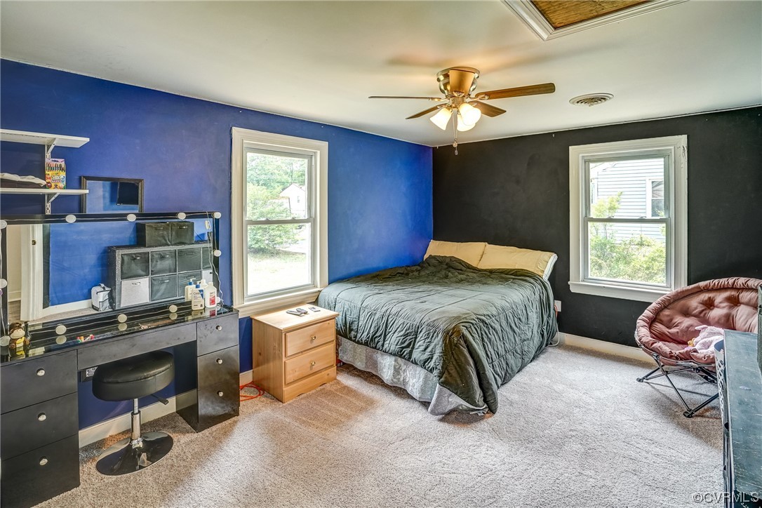 3312 Hawkins Road Henrico, VA 23228 - Photo 14 of 32 a bedroom with a bed and a window
