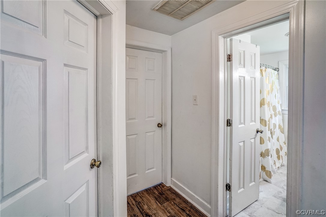 3312 Hawkins Road Henrico, VA 23228 - Photo 16 of 32 a view of a bathroom with a sink and mirror