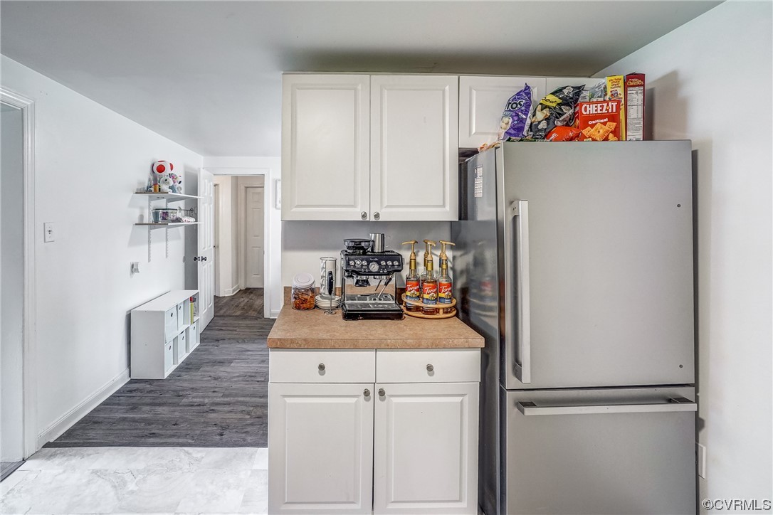 3312 Hawkins Road Henrico, VA 23228 - Photo 17 of 32 a kitchen with stainless steel appliances granite countertop a refrigerator and a stove top oven