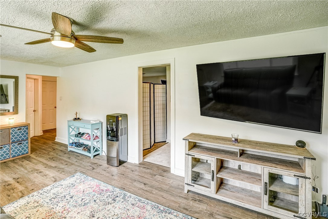 3312 Hawkins Road Henrico, VA 23228 - Photo 23 of 32 a living room with a flat screen tv and a fireplace
