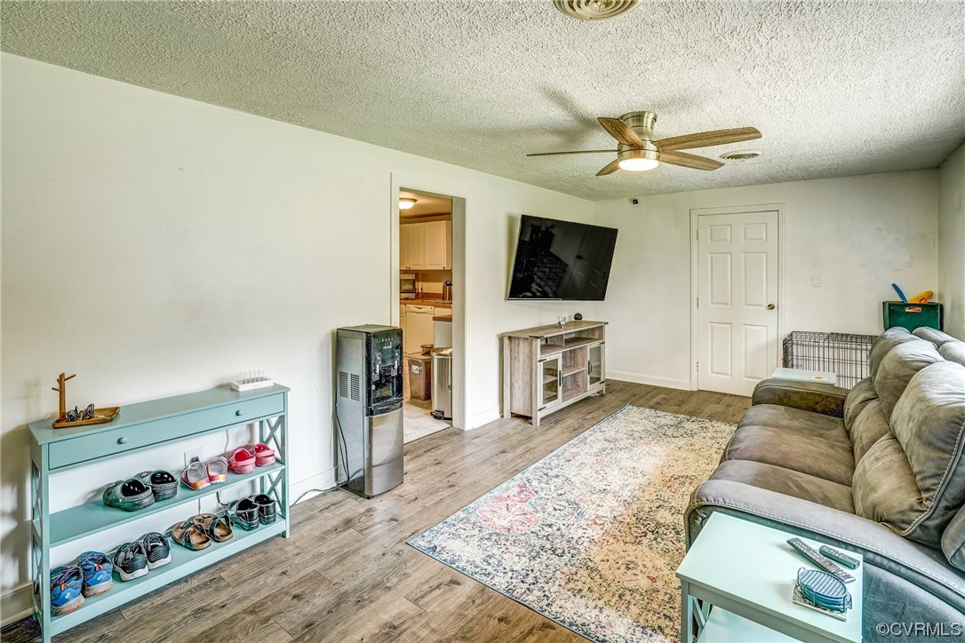 3312 Hawkins Road Henrico, VA 23228 - Photo 26 of 32 a living room with furniture and a flat screen tv